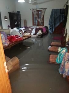 Mahmood’s living room devastated by a flood.
